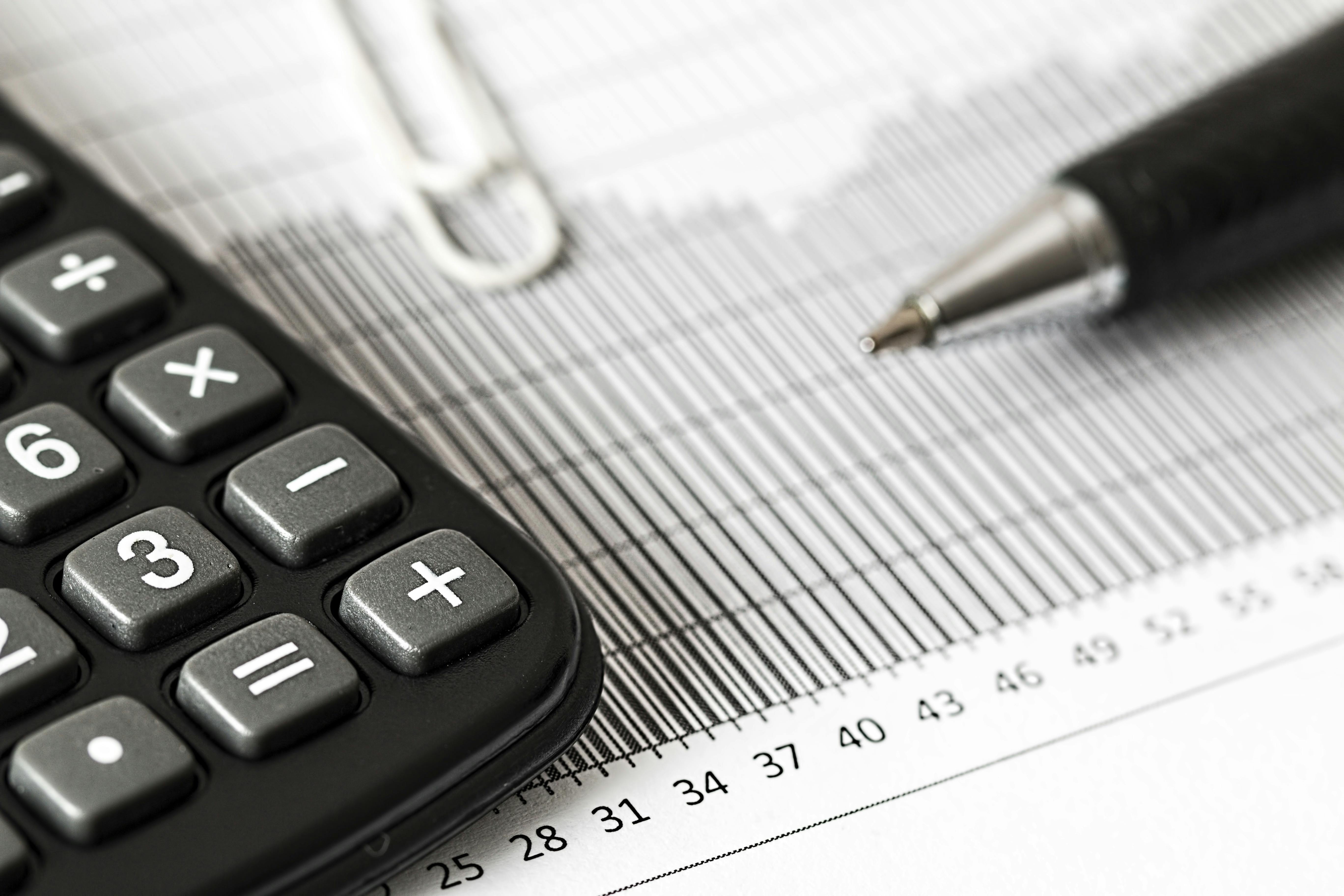 Calculator and financial documents for retirement planning